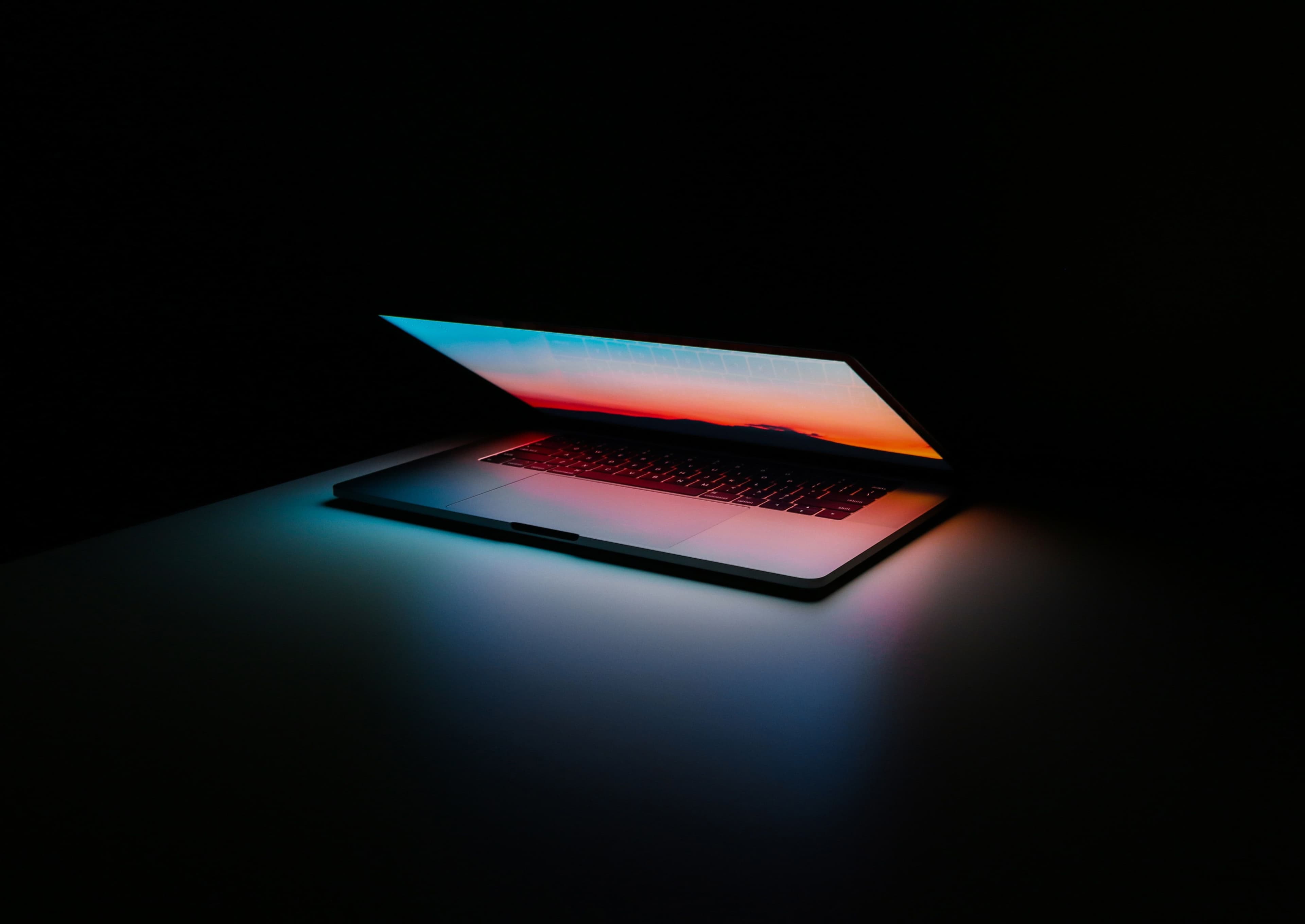 Photo of a laptop glowing